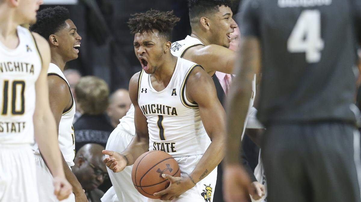 Wichita State’s Tyson Etienne celebrates a play against UCF during the first half on Saturday at Koch Arena.