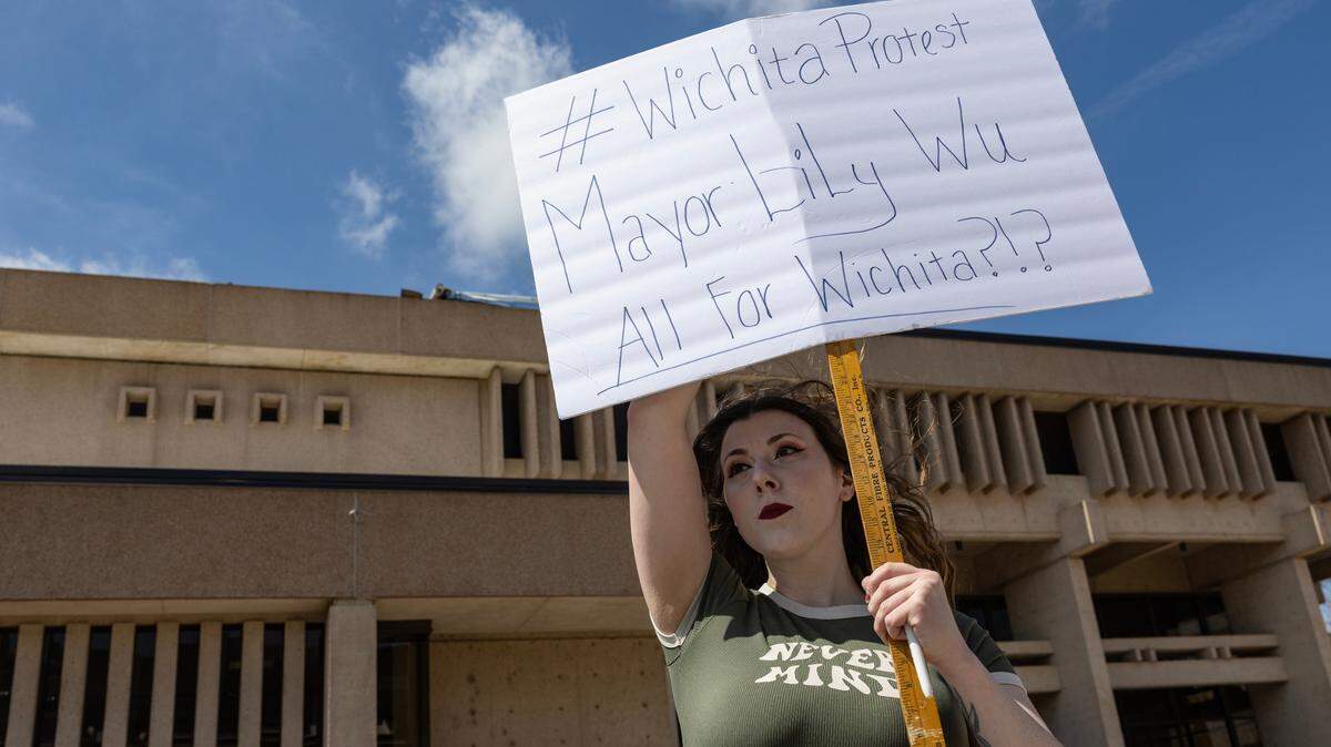 Tara Schooler was one of a small group of protesters that gathered outside of the old public library on Saturday to protest Wichita Mayor Lily Wu’s handling of a proclamation for Transgender Day of Visibility.