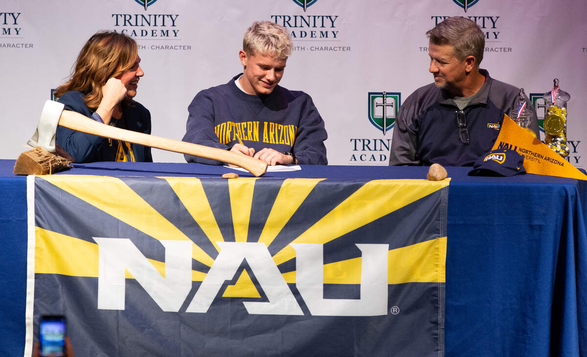 Trinity Academy senior Clay Shively signed his letter of intent to Northern Arizona cross country and track and field on Wednesday.
