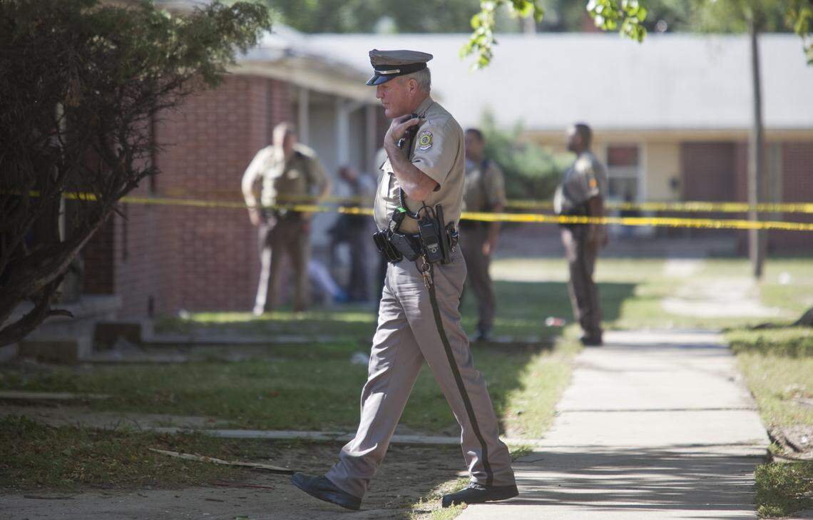Wichita Police Officer Bob Bachman works a crime scene in north Wichita last summer. Bachman was a long-time member of the SWAT team and has been involved in two officer-involved shootings.
