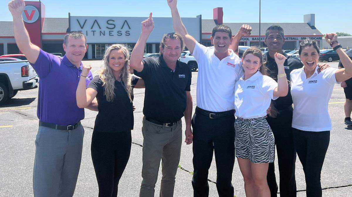 Rodney Steven II, center in white shirt, and his Genesis Health Clubs have acquired Wichita’s two Vasa Fitness gyms and will rebrand them with the Genesis name and look.