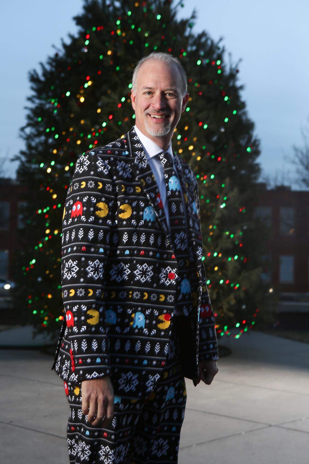 Derek Sorrells show off his Pac Man suit in Old Town Square. Sorrells is the co-owner of The Arcade, Old TownÕs popular retro arcade at 139 N. Mead.(December 23, 2018)