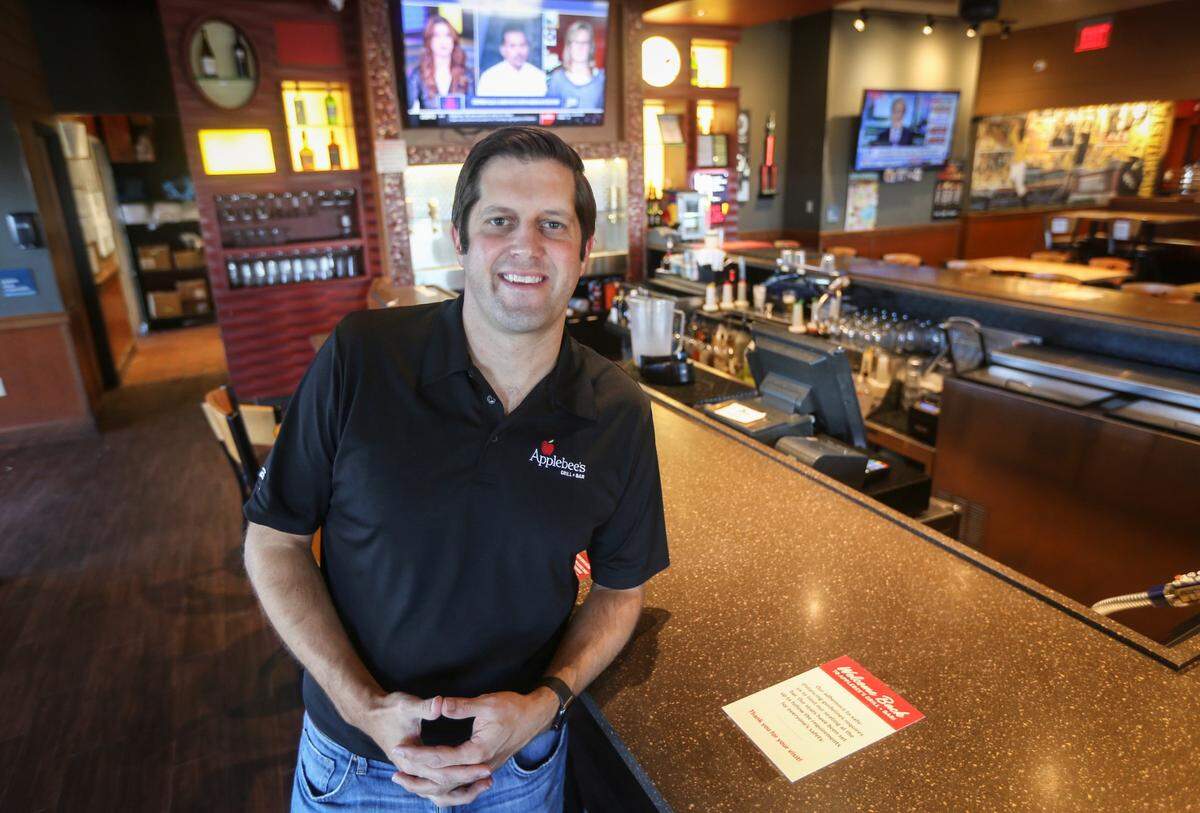 Jon Rolph, shown in a 2020 photo, is an especially active person with six children. He also serves as CEO of Thrive Restaurant Group and is on the Kansas Board of Regents. At various points in his cancer journey, he’s had to learn to slow down and take care of himself.