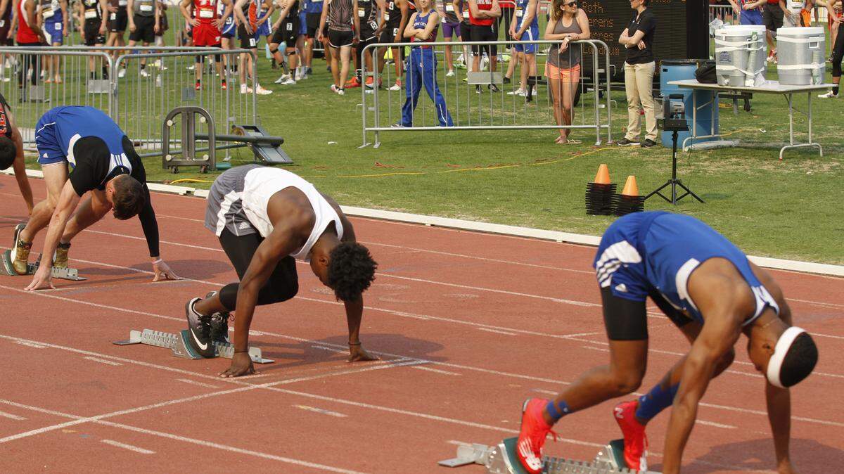 South's Phillip Landrum (left), Southeast's Ollie McGee (center) and South's Deron Dudley (right) have created one of the top trios in Kansas track with each coming in the top three of last year's 100 or 200-meter dashes.