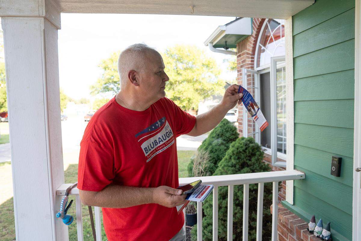 Republican Jeff Blubaugh knocks on doors in a neighborhood near 55th St. S. and Victoria. Blubaugh is running for District 2 Sedgwick County Commission. He’s been knocking on doors since April.