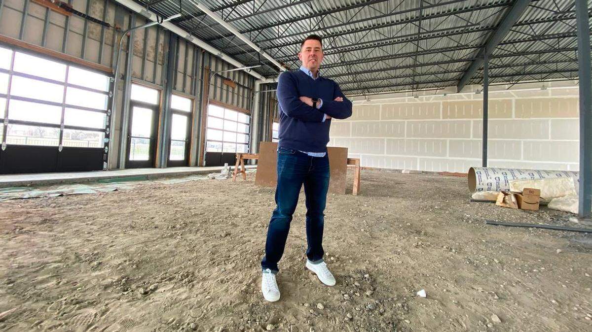 Justin Neel stands in the middle of what became Social Tap Drinkery at Wichita State University in 2021.