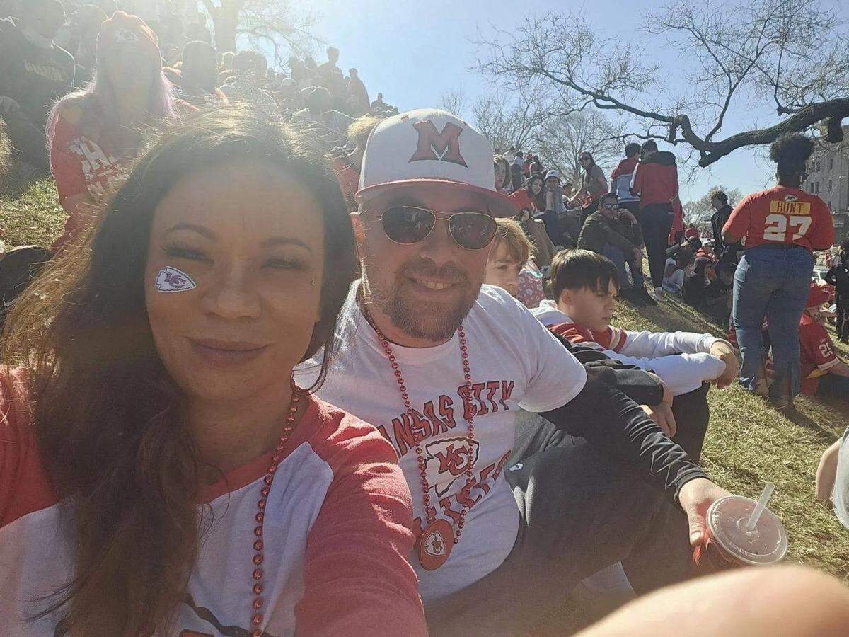 Casey and Trey Filter sit on a hill near Union Station on Wednesday. “It was a beautiful day,” Casey Filter said. “It was perfect. It was a beautiful day and nothing was wrong until there was something wrong.”