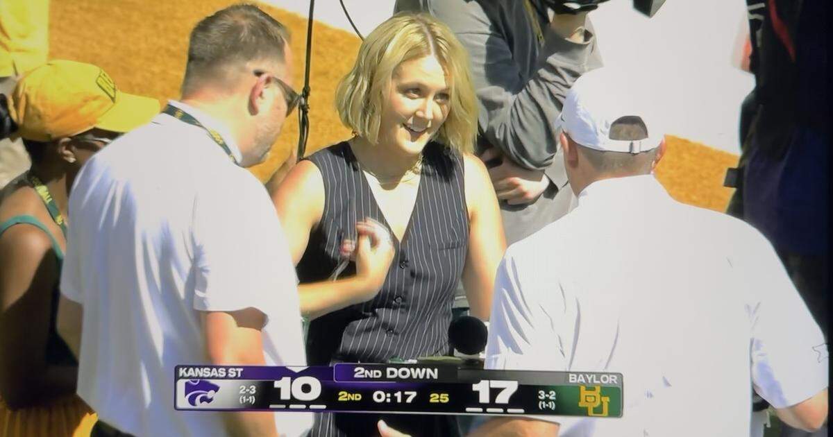 ESPN sideline reporter Tori Petry got right back up after colliding with Kansas State quarterback Avery Johnson during a football game at Baylor.