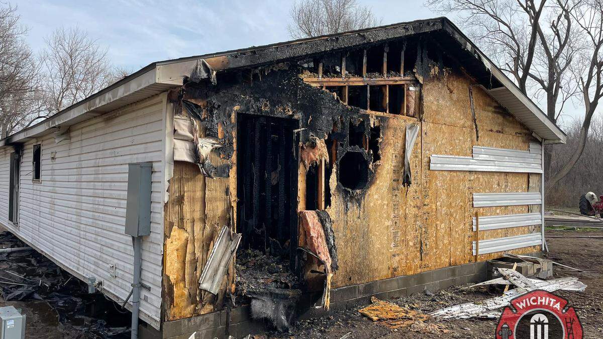 One person and at least one dog were injured in a Thursday morning house fire in south Wichita, according to the Wichita Fire Department.