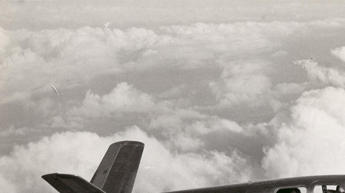 A photograph of a Beechcraft Bonanza Model 35 airplane in flight.   
Aviation pioneers Walter H. and Olive Ann Beech founded the Beech 
Aircraft Company in Wichita in 1932.

Date: 1947
