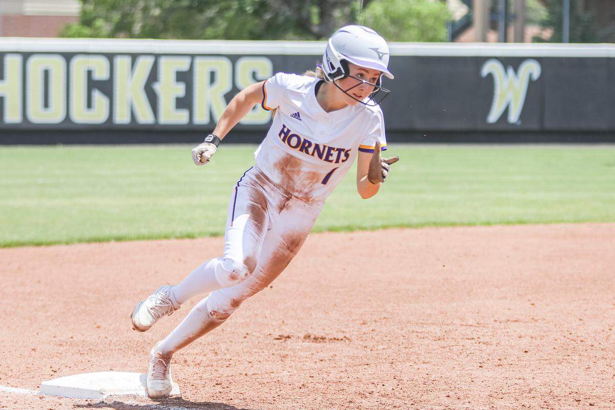 Valley Center junior Lucy Hooper rounds third base during the 5A semifinals game against Eisenhower held at Wilkins Stadium on Saturday, May 28, 2022.