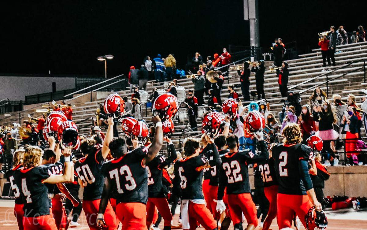 The El Dorado football team celebrates its first playoff win in school history after a 46-14 thumping of Winfield in the opening round of the Class 4A playoffs last Friday.