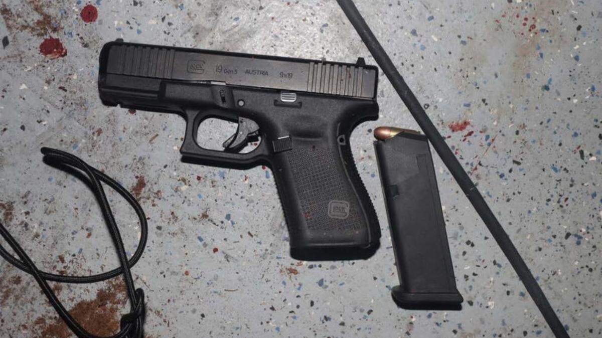 A photo of the 9 mm handgun found under Gregorio Banuelos after he was fatally shot by the SWAT team in west Wichita on May 25, 2022.
