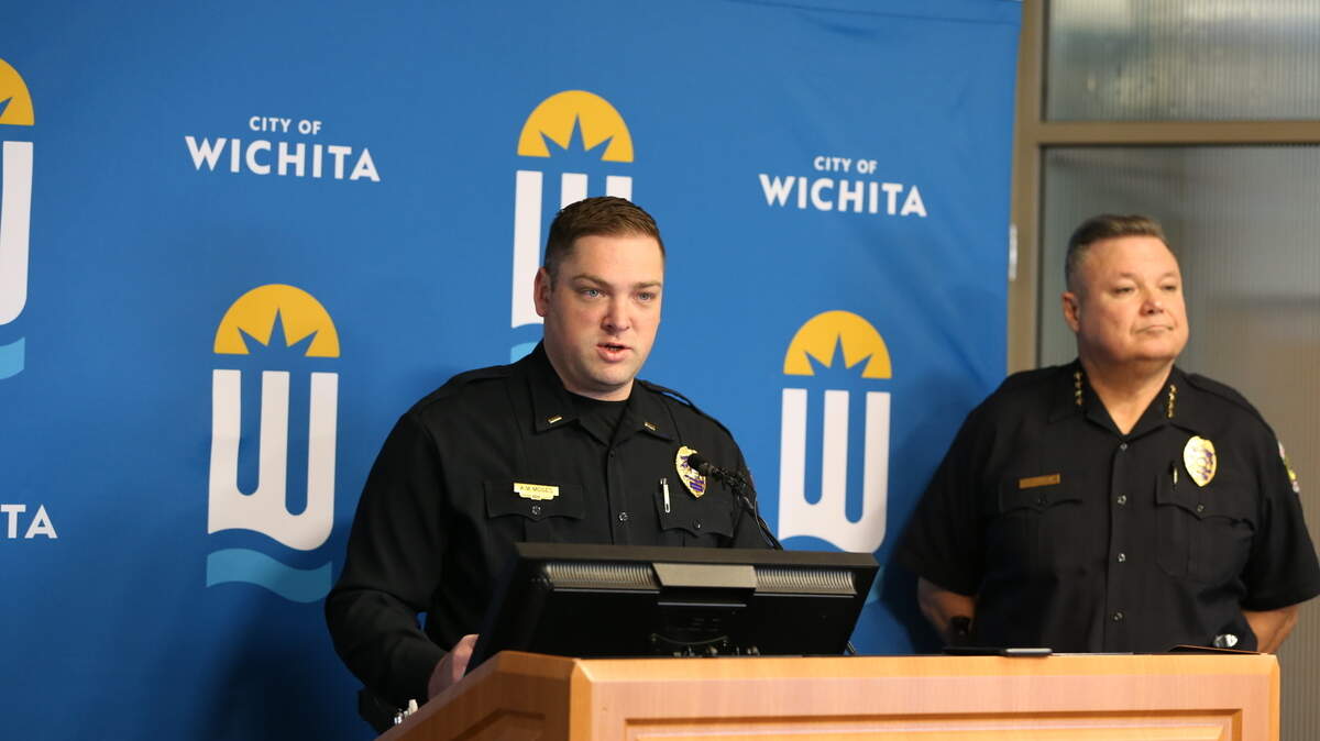 Wichita Police Department Lt. Aaron Moses, flanked by Chief Joe Sullivan, gives an update and identifies a possible suspect Monday in the deadly shooting at Onyx Club early Sunday.