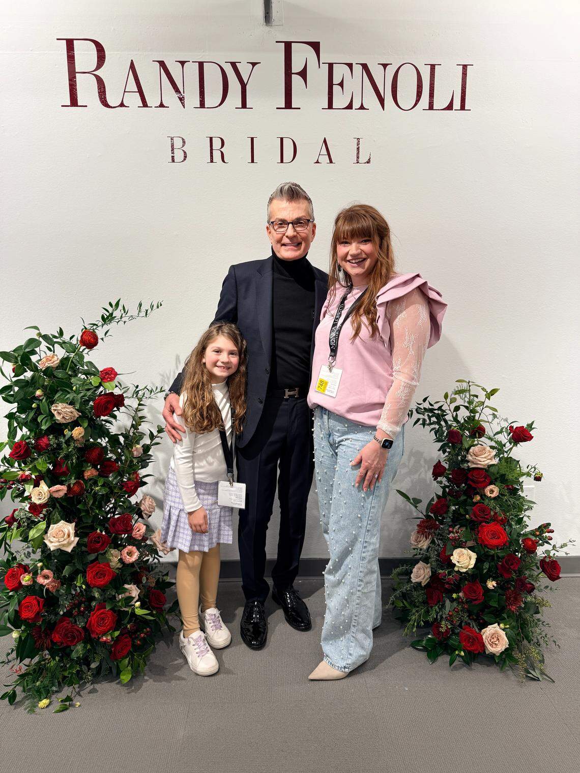 Ericia Stevens, right, is opening a Bradley Fair pop-up version of her Bella Veil Bridal in Newton. The Bradley Fair dresses will start at $1,500 and will include designs from “Say Yes to the Dress” host Randy Fenoli, center. Also pictured is Stevens’ daughter, Savvy.