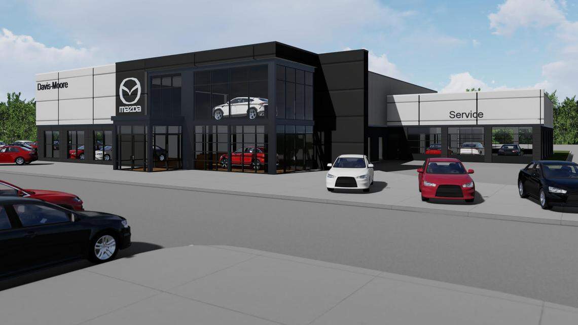 Davis-Moore Auto Group president Sean Tarbell is almost a little sad about it, but Davis-Moore Mazda is changing its orange-and-lime-green look to a black-and-gray one.