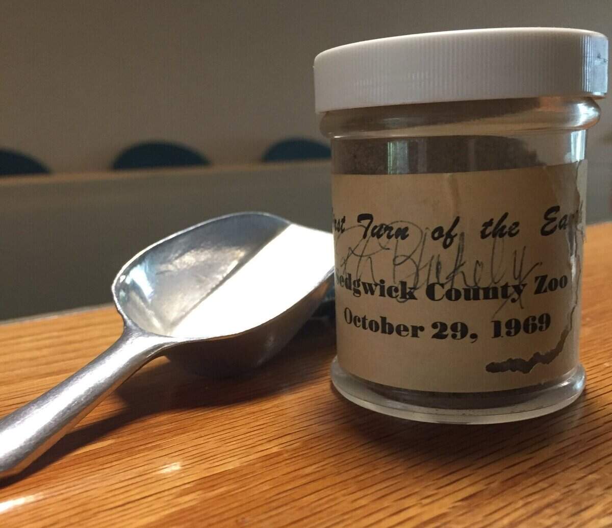 During the groundbreaking for the Sedgwick County Zoo in 1969, schoolchildren in attendance were given small jars and scoops and told they could save some of the dirt from the site in the containers. This one was a longtime treasure of Barb Hoppins, who was one of the children present that day. It’s signed by the zoo’s first director, Ron Blakely.