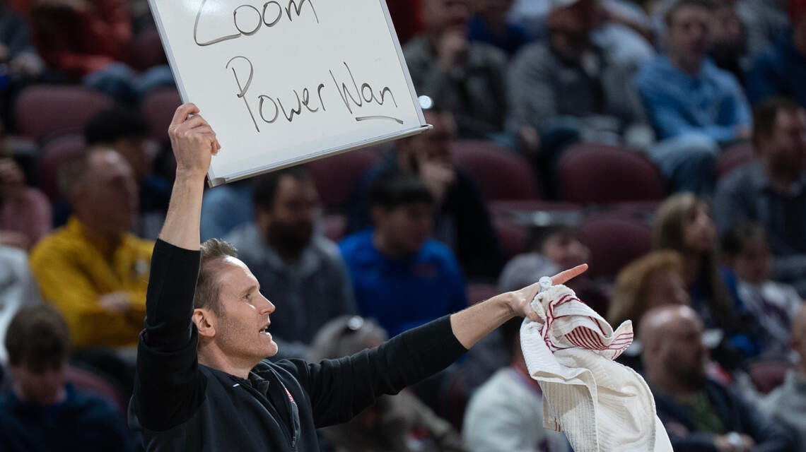 The coach behind the clipboard that helped Houston Cougars’ offense hum to NCAA win