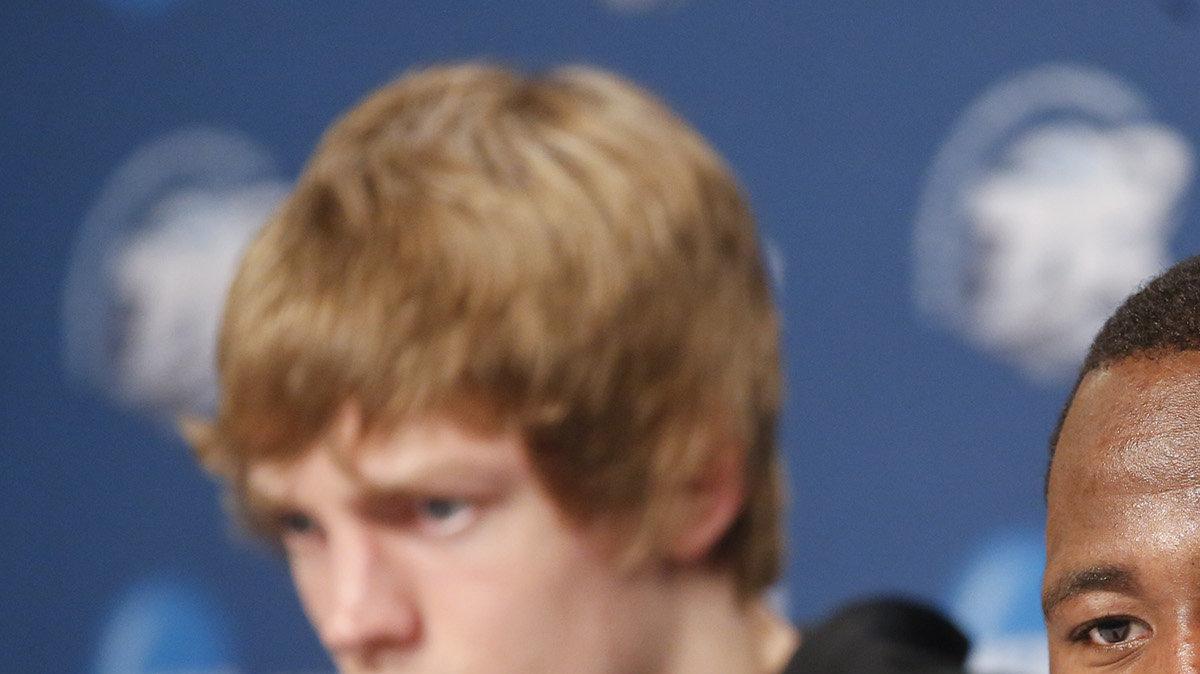 Wichita State, Malcolm Armstead, right, and Ron Baker talk with the media at Staples Center in Los Angeles on Friday. The Shockers will face Ohio State on Saturday for a spot in the Final Four in Atlanta . (March 29, 2013)