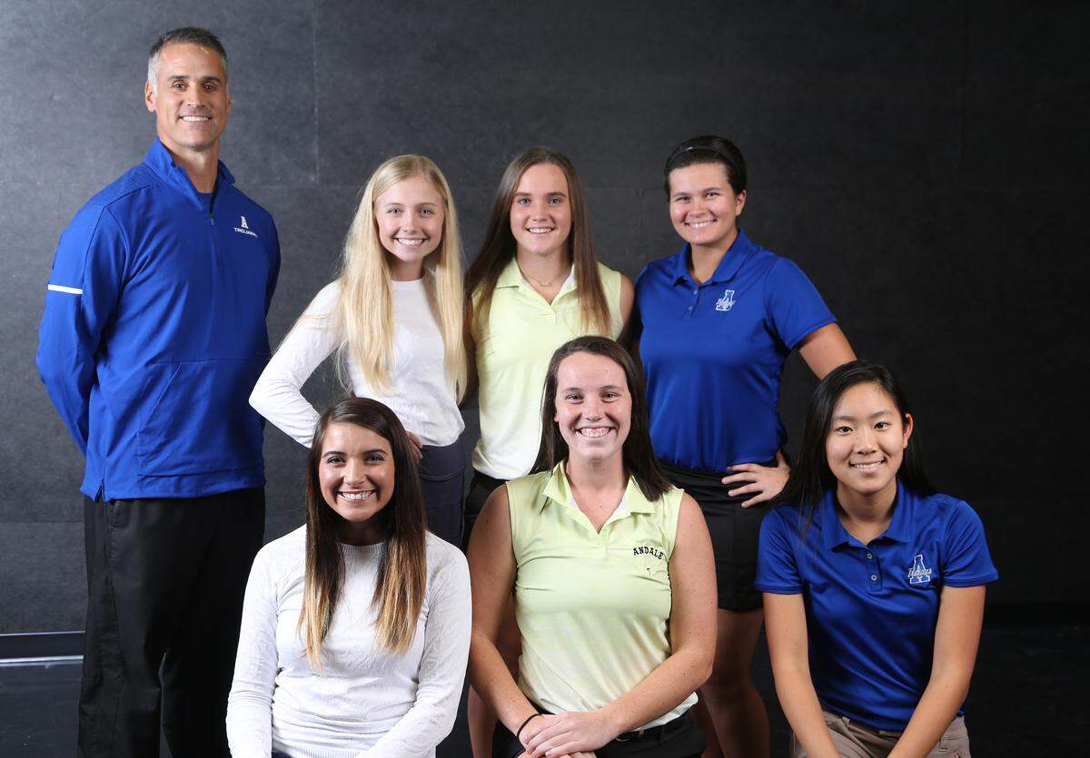 All metro golf from left, Ryan Harshaw, Andover Trojans coach, front row,  Madison Slayton, Trinity.  Morgan Brasser, Andale. Tiffany Chan, Andover.  Back row: Hanna Hawks, Trinity Academy, Jacy Anderson, Andale, Shauna Lee, Andover.  (November 7, 2018)