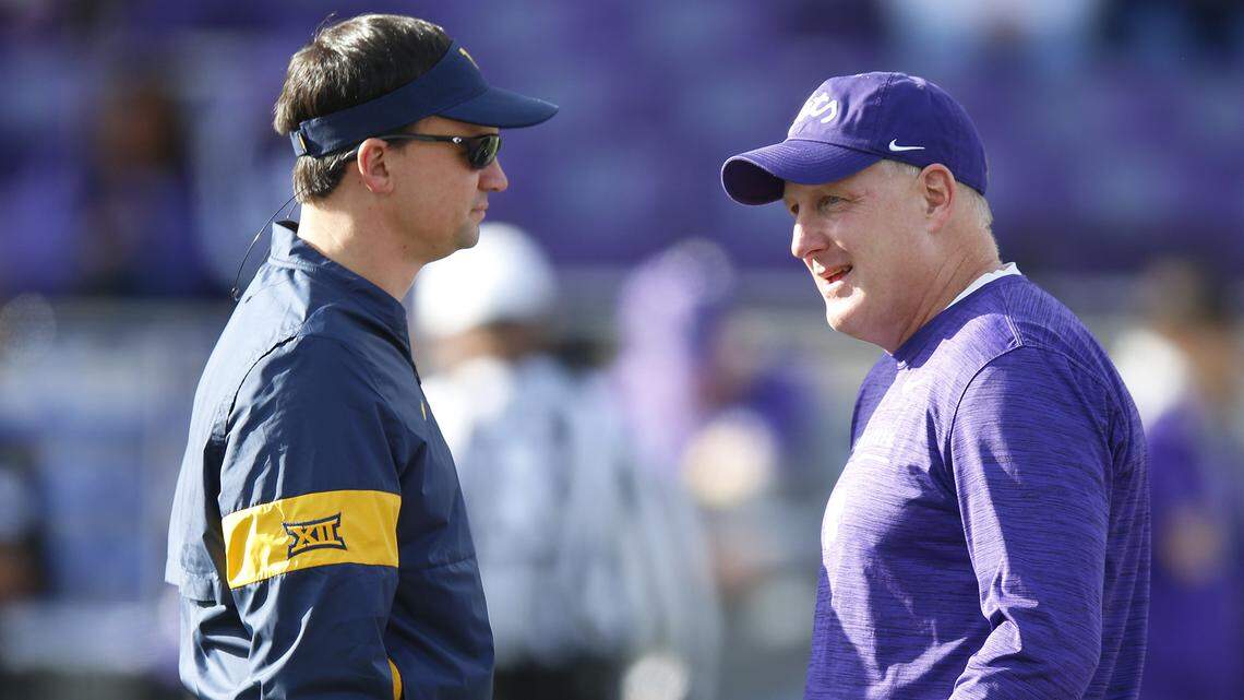 West Virginia head coach Neal Brown and K-State head coach Chris Klieman, both new head coaches in the Big 12, talks before the game Saturday in Manhattan. (November 16, 2019)