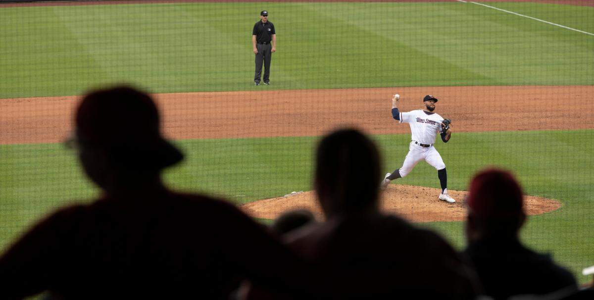Fans watch as the Wichita Wind Surge take on the Midland RockHounds at Riverfront Stadium.