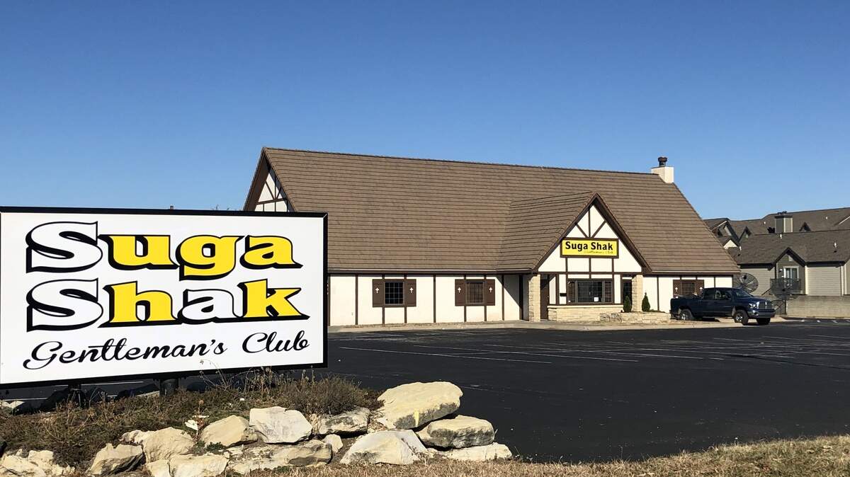 The former Chalet building at 3030 N. Penstemon now has signs advertising the “Suga Shak Gentleman’s Club.”