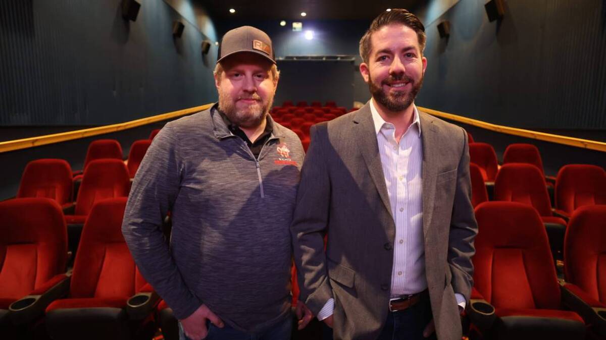 Tyler Cooper, left, and business partner Ryan Blasdel are opening Boulevard Theatres this week on the west side of Towne West Square where Regal’s Movie Machine had been.
