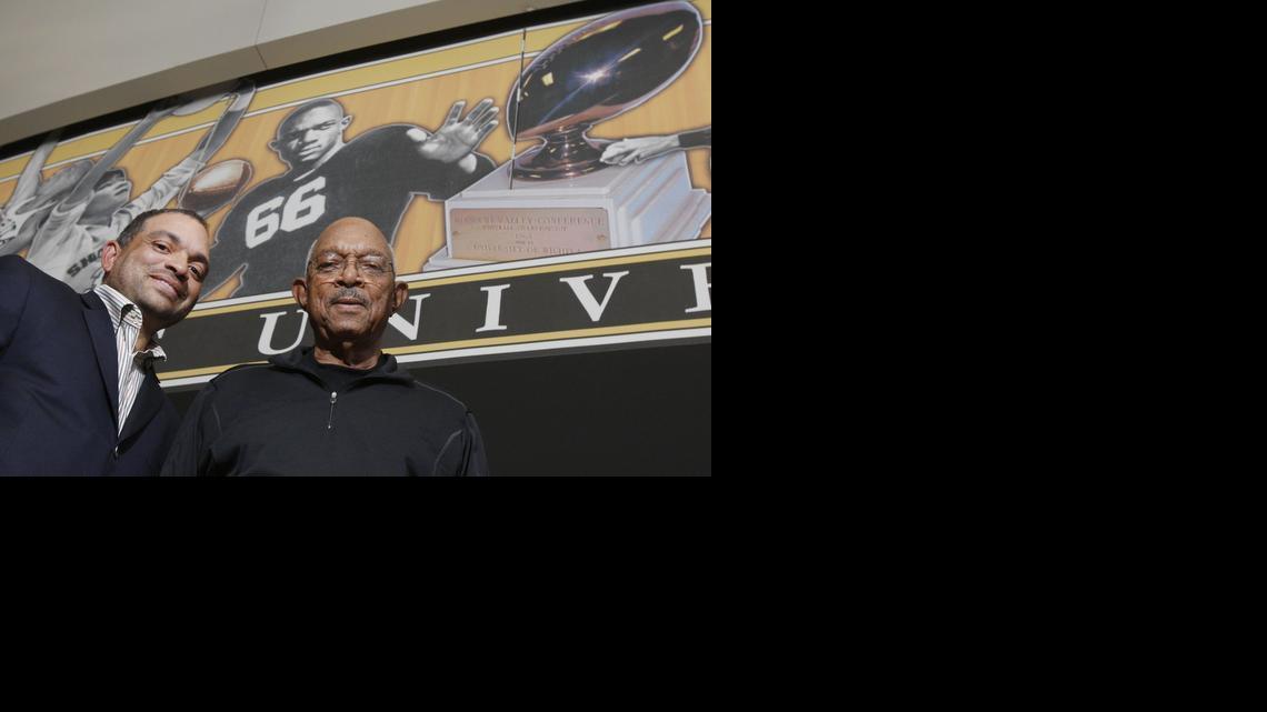 Linwood Sexton, right, was a star football player at the University of Wichita from 1946-48. His son Eric, left, is WSU’s athletic director.

