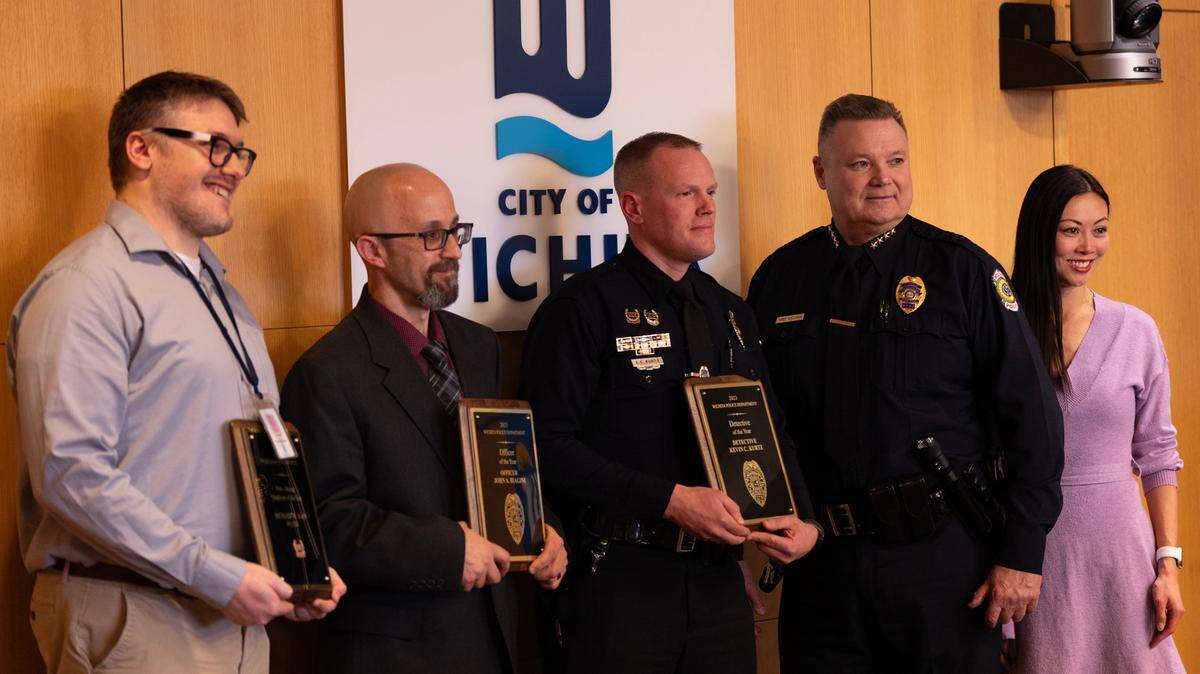 The Wichita Police Department held an awards assembly on Wednesday. Those honored were, from left, Non-Sworn Employee of the Year Richard Dain, Officer of the Year John Biagini and Detective of the Year Kevin Kurtz. Also honored but unable to attend was Volunteer of the Year Madison McDaniel. At far right is Wichita Police Chief Joe Sullivan and Wichita Mayor Lily Wu.