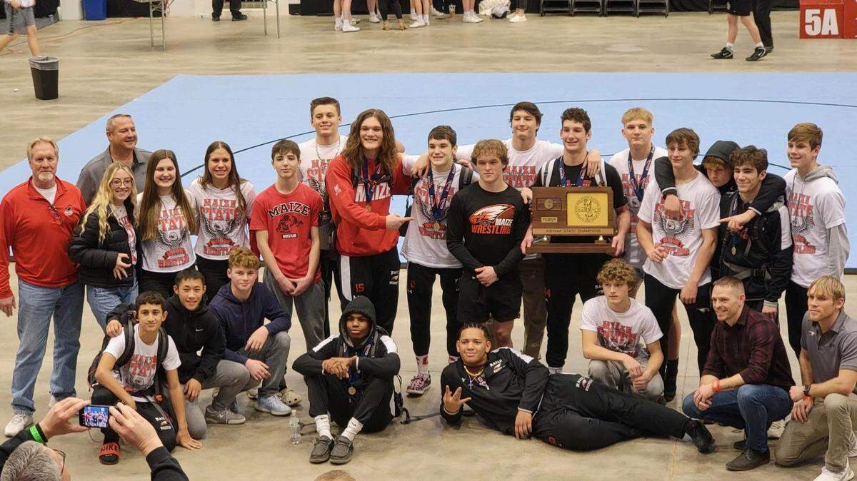 The Maize boys wrestling team won its first team state championship in school history by claiming the Class 5A title at the Kansas high school state meet at Hartman Arena on Saturday.
