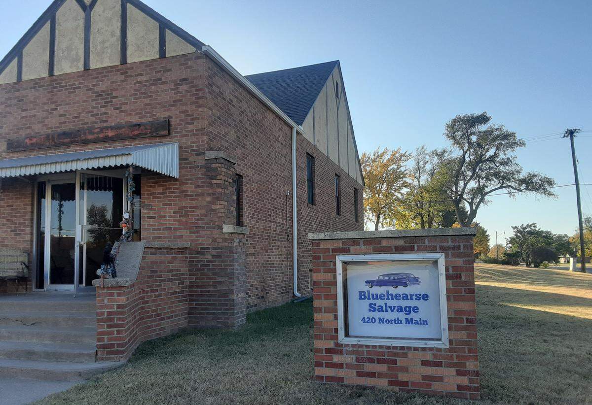 This business sign in the front yard of Dorothy Tobe and Mike Rosseau’s home allows them to live there and comply with the zoning ordinance of the city of St. John.