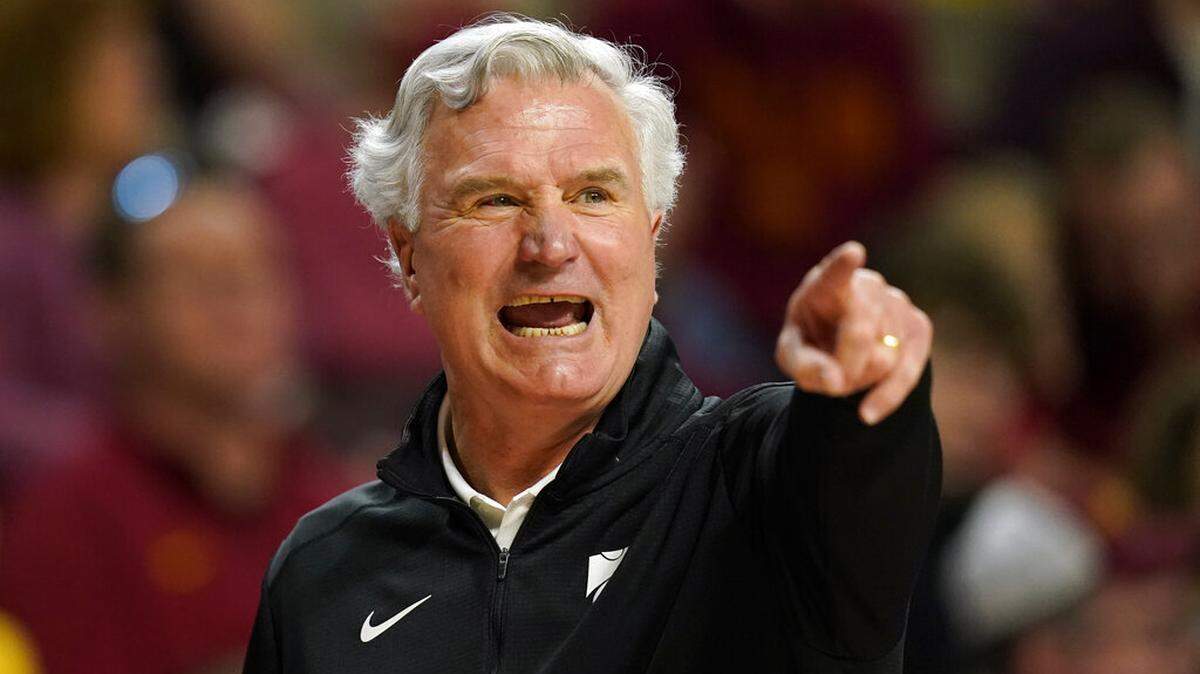Kansas State head coach Bruce Weber directs his team during the first half of an NCAA college basketball game against Iowa State, Saturday, Feb. 12, 2022, in Ames, Iowa. (AP Photo/Charlie Neibergall)