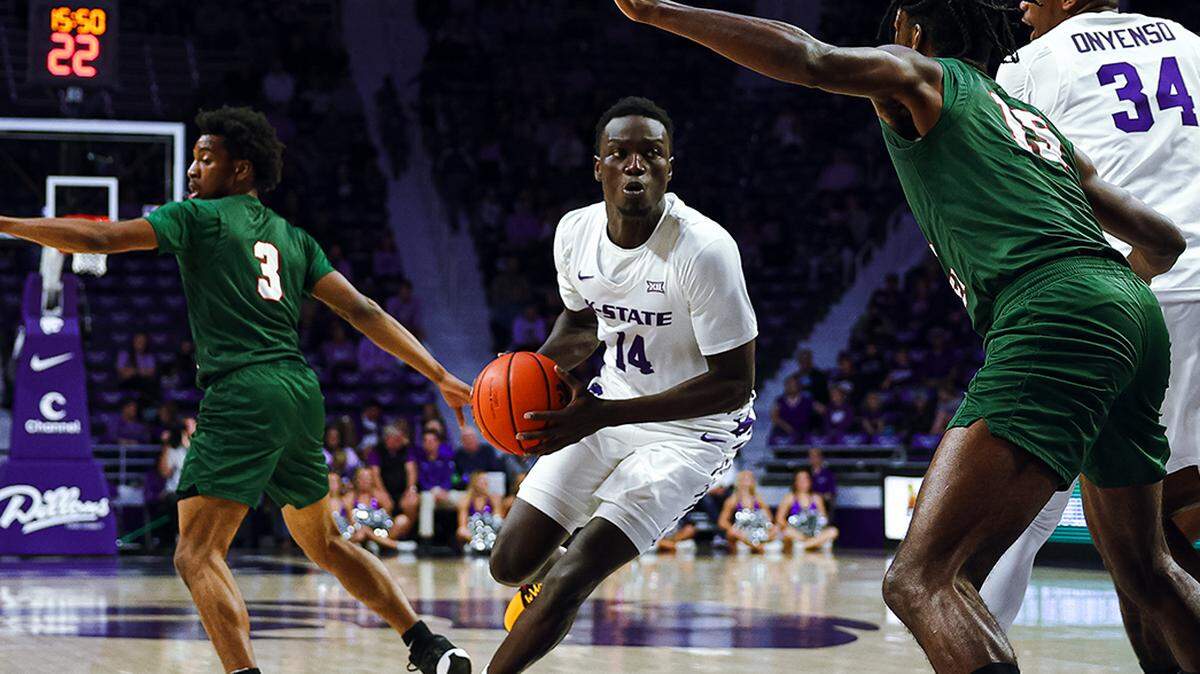 Kansas State basketball forward Achor Achor drives to the basket against Mississippi Valley State.