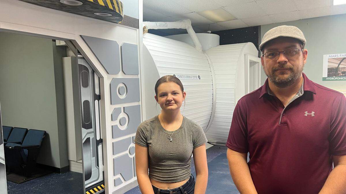 Travis Keyser, with significant help from his daughter, Lilyanne, is opening the long-awaited Space Discovery Institute in Andover.