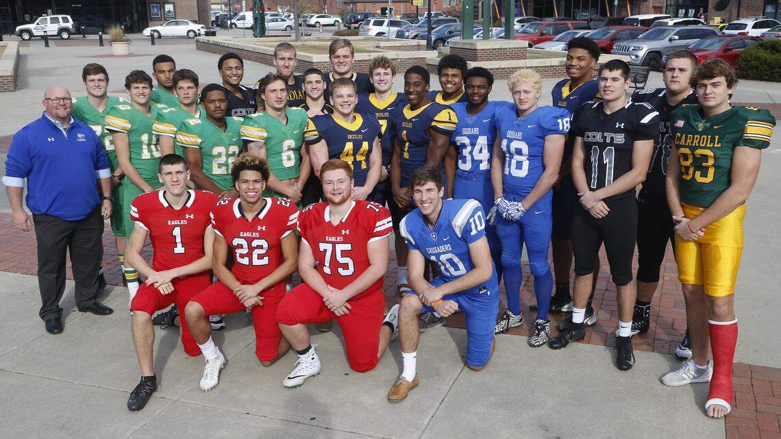 All metro football team from left : front row,  Caleb Grill, Maize, Preven Christon, Maize, Nic Devore, Maize, Scott Valentas, Kapaun. Second row, Tom Beason, Goddard coach, Bryce Atkinson, Derby, Dax Benway, Derby, Hunter Igo, Derby, Tre Washington, Derby, Jackson Syring, Derby, Josh Carter, Northwest, Breece Hall, Northwest, Dhimani Butler, Goddard, Zeke Howell, Goddard, Tyler Kahman, Campus, Clay Cundiff, Bishop Carroll. Back row, Isaac Keener, Derby, Quinton Hicks, Campus, Mason Fairchild, Andale, Scott Easter, Andale, Cody Fayette, Maize South, Regan Jones, Northwest,  Javon Wheeler, Northwest,  Marcus Hicks, Northwest, Seth Falley, Campus. (November 28, 2018)
