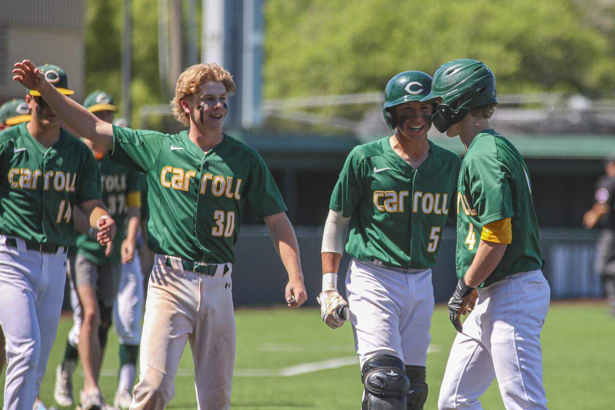 Bishop Carroll celebrates their win against Valley Center in the 5A quarterfinals held at Eck Stadium on Friday, May 27, 2022.