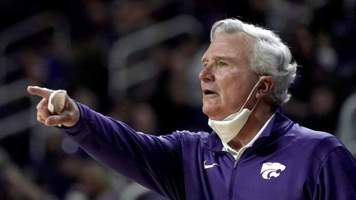 Kansas State head coach Bruce Weber talks to his players during the first half of an NCAA college basketball game against Baylor Wednesday, Feb. 9, 2022, in Manhattan, Kan. (AP Photo/Charlie Riedel)