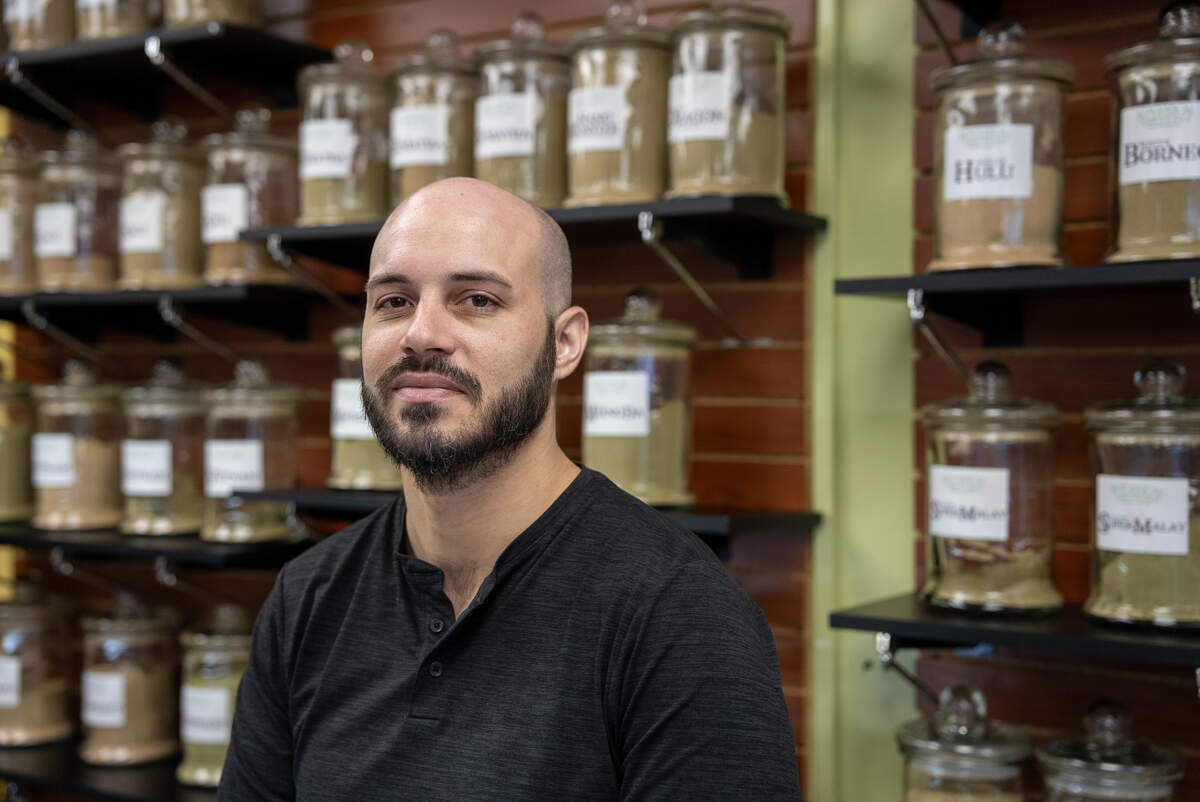 Josh Schwab behind the counter of the Kratom City store he operates in south Wichita. Kratom will be illegal in Kansas beginning on Wednesday.