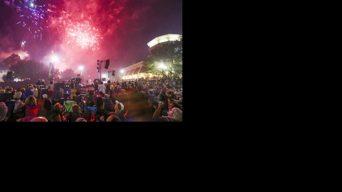 People take in the fireworks show at Bradley Fair on Thursday night following a jazz concert. 

