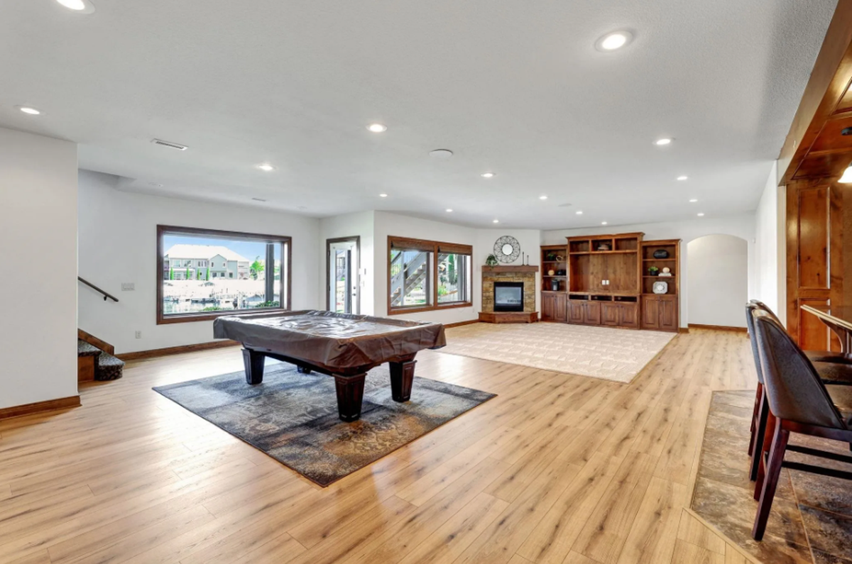 A look at the pool table and wet bar inside 2612 N. Paradise Court, a waterfront Wichita property listed for $1 million.