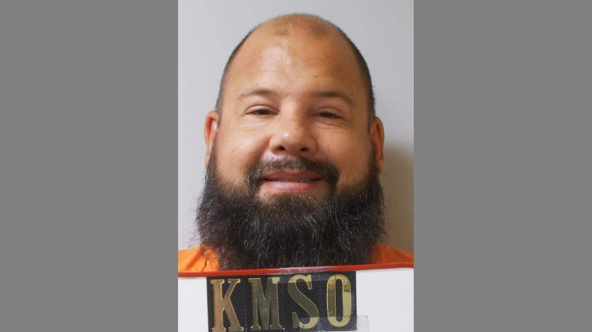 In this photo provided by the Kingman County Sheriff’s Office, Andrew John Pleviak is pictured in a booking photo dated Sept. 4, 2019. Pleviak, a former agent with U.S. Immigration and Customs Enforcement, has been accused of impersonating an immigration officer during a foiled attempt to help an inmate escape from a local jail in Kansas. (Kingman County Sheriff’s Office via AP)