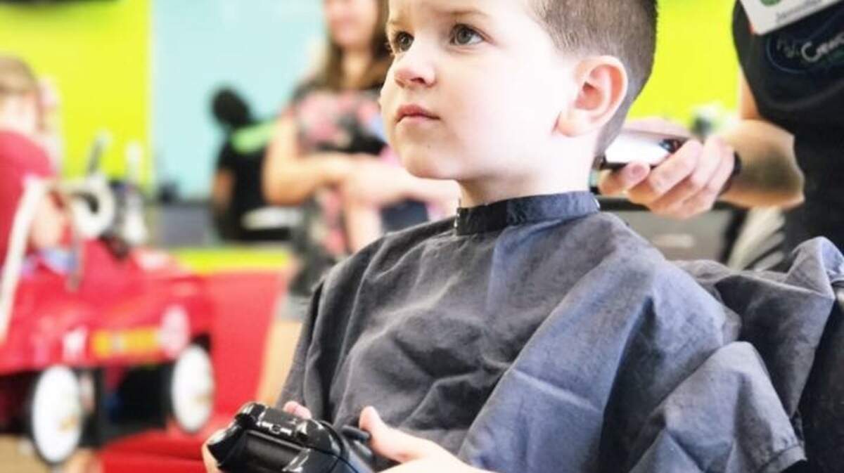 Children can play games while getting their hair cut at Pigtails & Crewcuts, which will have a second Wichita salon at Regency Lakes by August.