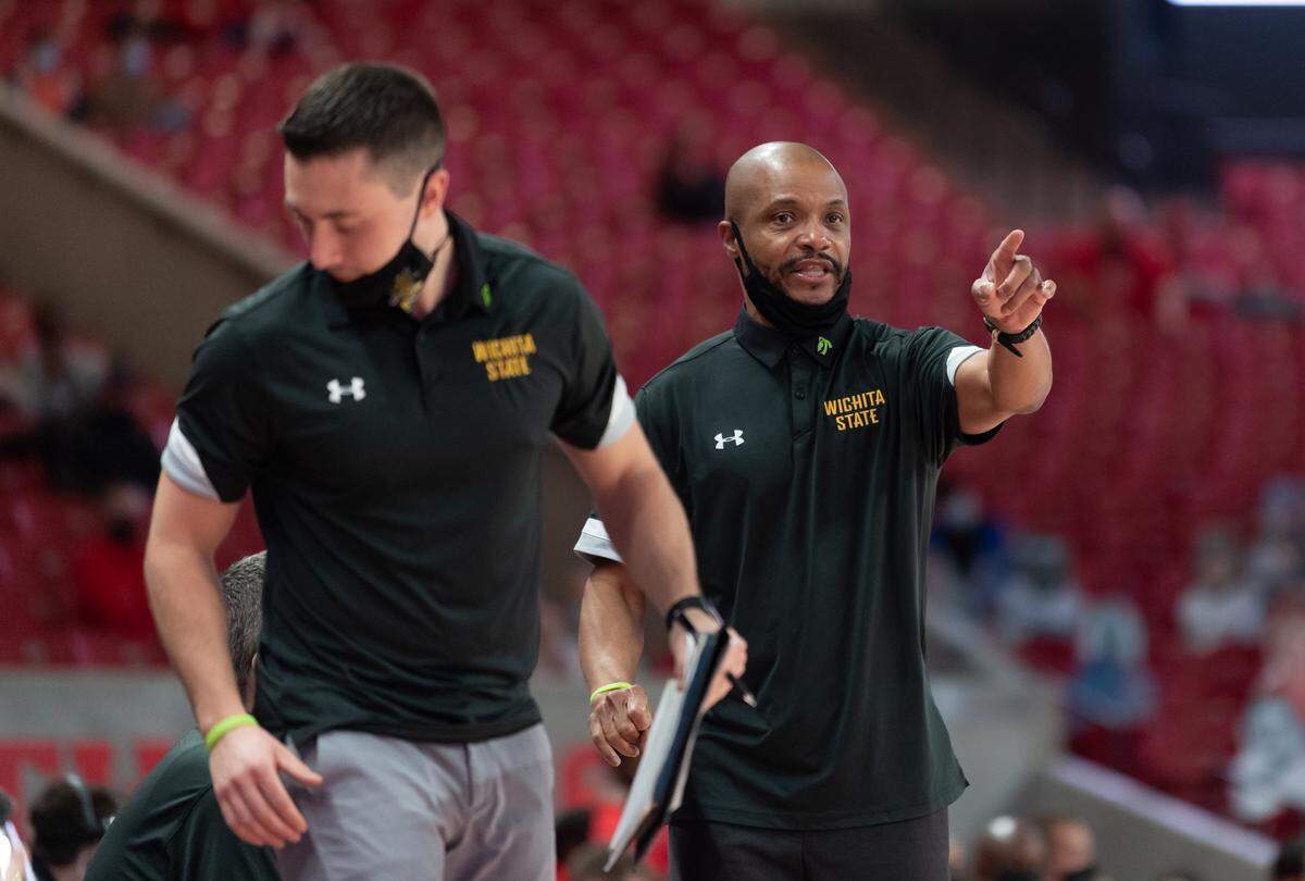 Wichita State interim coach Isaac Brown gives instruction to the Shockers during their game on Wednesday at Houston.