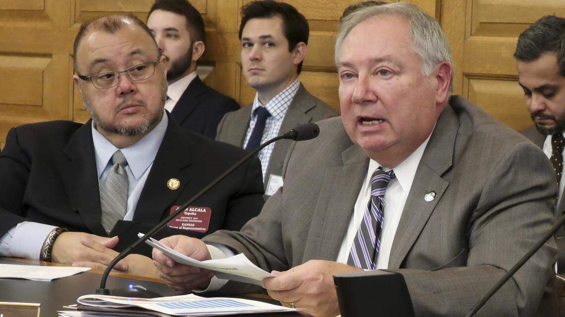 Kansas Senate Majority Leader Jim Denning, right, R-Overland Park, asks questions during a briefing on Democratic Gov. Laura Kelly’s budget proposals on Jan. 17. (AP Photo/John Hanna)