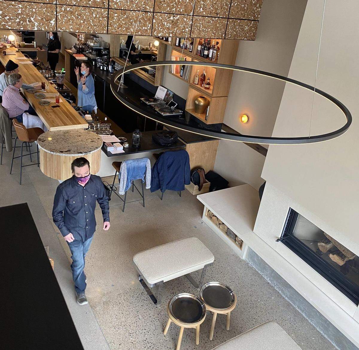 First Mile Kitchen features a fireplace for customers to enjoy, and the kitchen his a live-fire hearth for cooking.