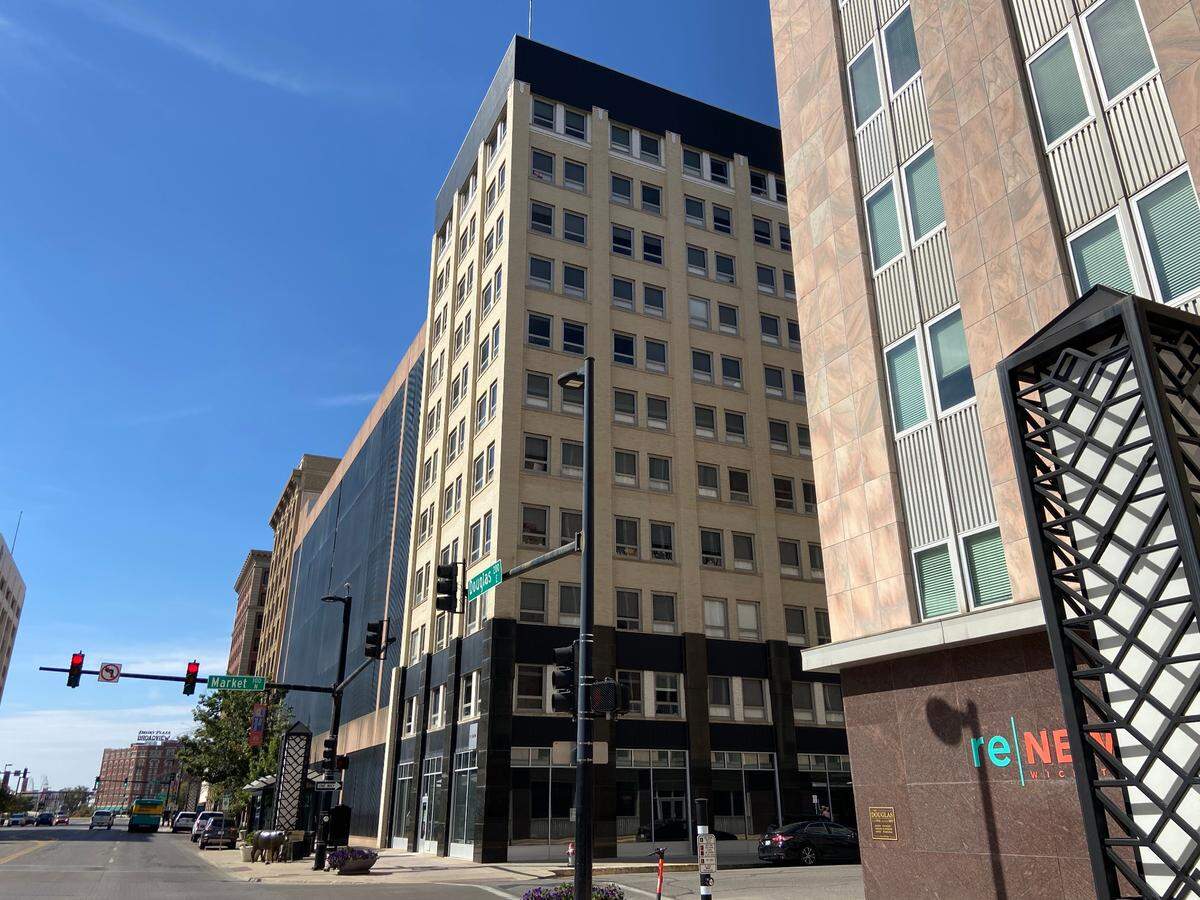 Urban Routine Wellness owner Derek Davenport is moving his downtown business to the former Sente space (center) on the northwest corner of Douglas and Market and opening a new one on the east side where Pinspiration was.