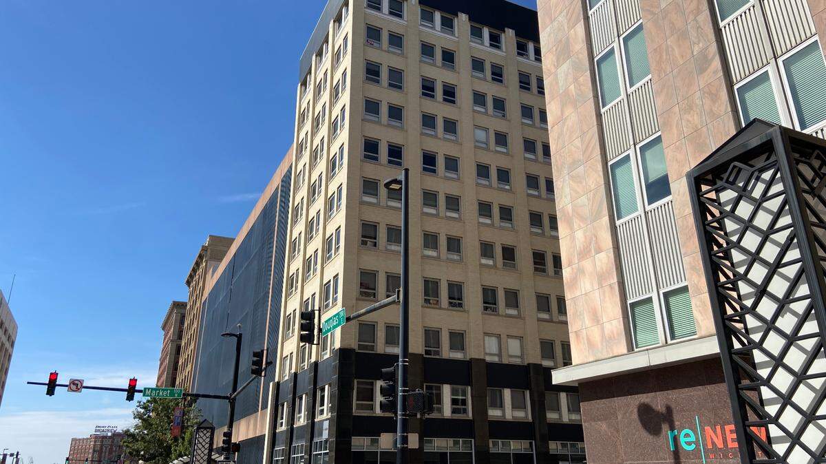 Urban Routine Wellness owner Derek Davenport is moving his downtown business to the former Sente space (center) on the northwest corner of Douglas and Market and opening a new one on the east side where Pinspiration was.