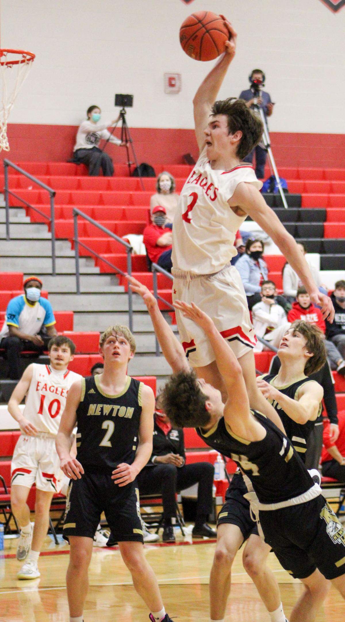 Maize High School junior basketball player Kyle Grill dunked in a game against Newton.
