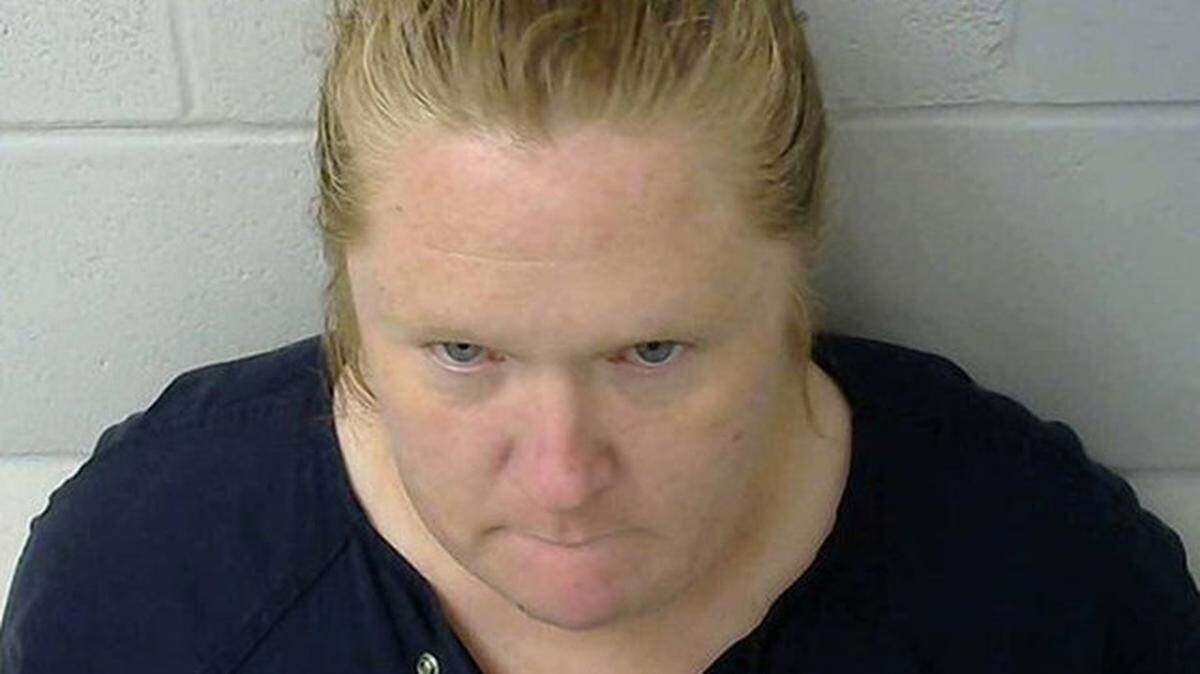 Amy Hall is accused of shooting her three teenagers